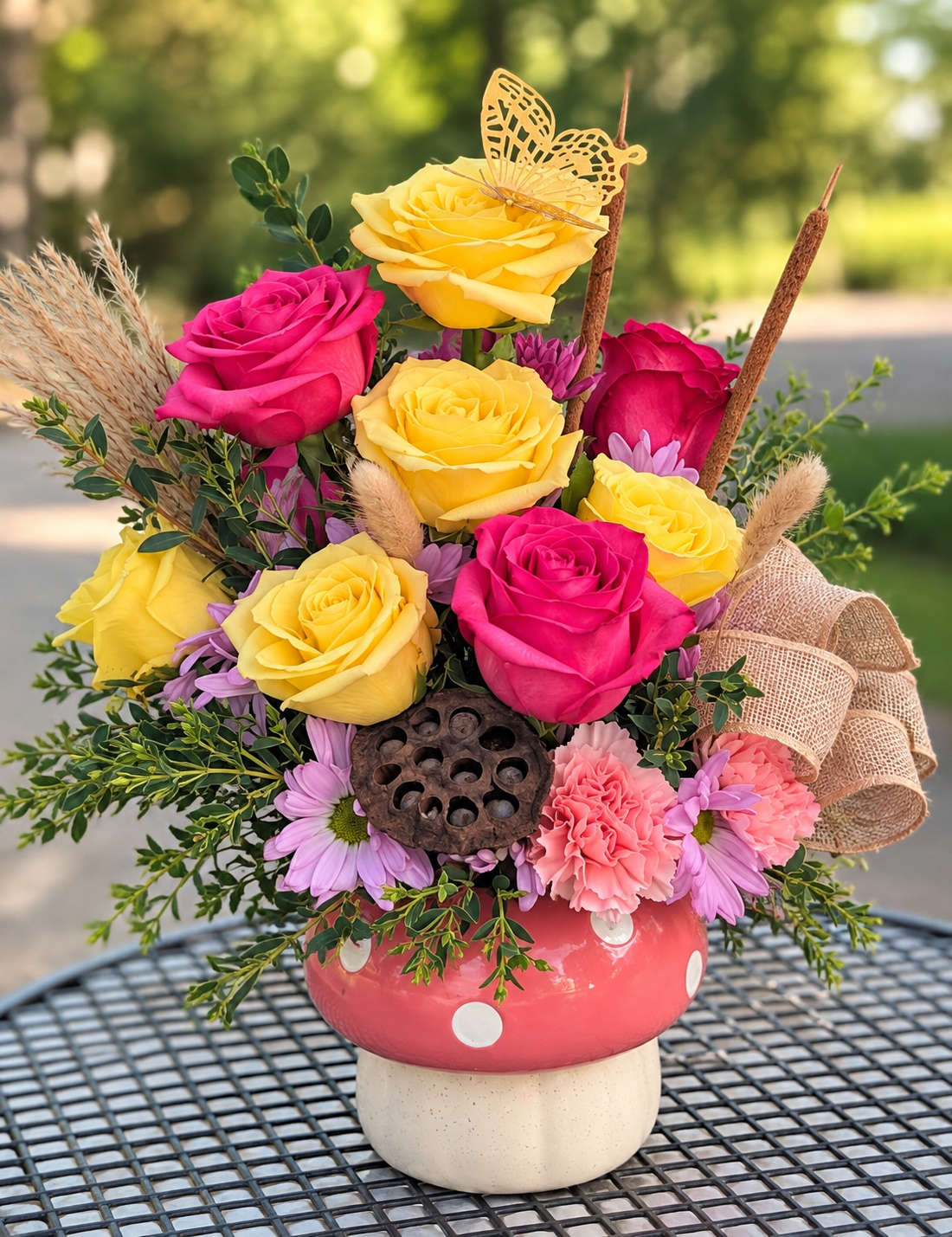 Yellow and pink rose Mushroom Arrangement